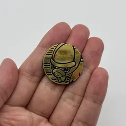 In hand, from Pokémon Coin Fan, full size