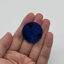 In hand, from Pokémon Coin Fan, full size