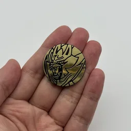 In hand, from Pokémon Coin Fan, full size