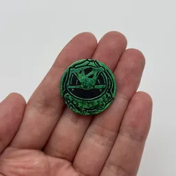 In hand, from Pokémon Coin Fan, full size