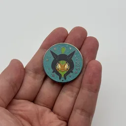 In hand, from Pokémon Coin Fan, full size