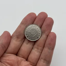 In hand, from Pokémon Coin Fan, full size