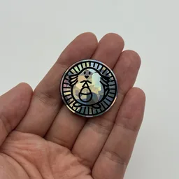In hand, from Pokémon Coin Fan, full size