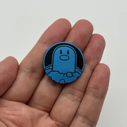 In hand, from Pokémon Coin Fan, full size