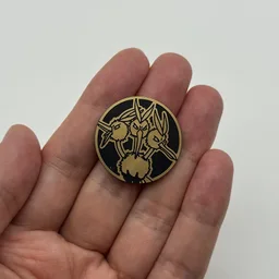 In hand, from Pokémon Coin Fan, full size