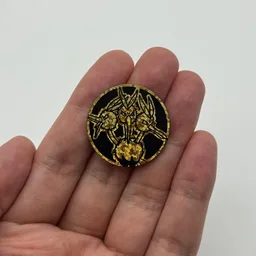 In hand, from Pokémon Coin Fan, full size