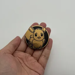 In hand, from Pokémon Coin Fan, full size