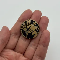 In hand, from Pokémon Coin Fan, full size