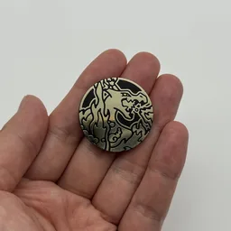 In hand, from Pokémon Coin Fan, full size