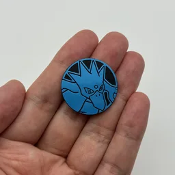 In hand, from Pokémon Coin Fan, full size