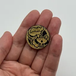 In hand, from Pokémon Coin Fan, full size
