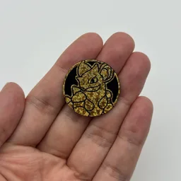 In hand, from Pokémon Coin Fan, full size