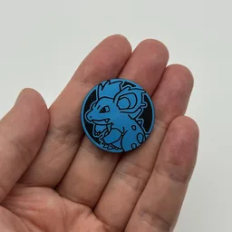 In hand, from Pokémon Coin Fan, full size