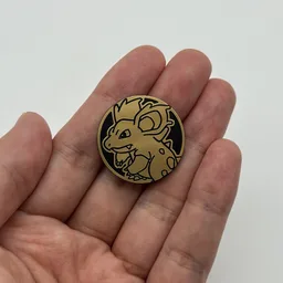 In hand, from Pokémon Coin Fan, full size