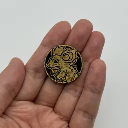 In hand, from Pokémon Coin Fan, full size