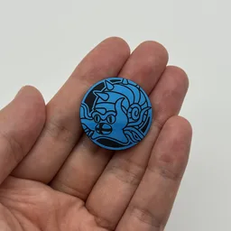 In hand, from Pokémon Coin Fan, full size