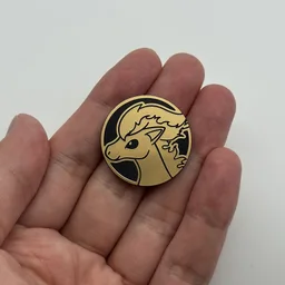 In hand, from Pokémon Coin Fan, full size