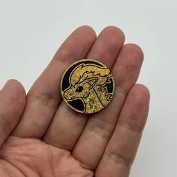 In hand, from Pokémon Coin Fan, full size