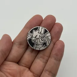 In hand, from Pokémon Coin Fan, full size