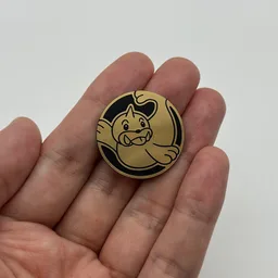 In hand, from Pokémon Coin Fan, full size