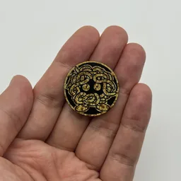 In hand, from Pokémon Coin Fan, full size