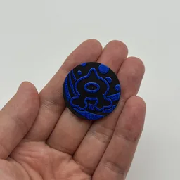 In hand, from Pokémon Coin Fan, full size