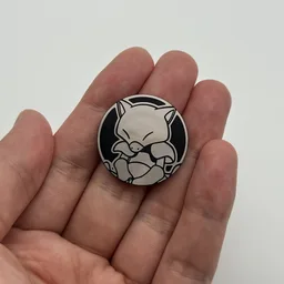 In hand, from Pokémon Coin Fan, full size