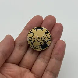 In hand, from Pokémon Coin Fan, full size