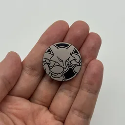 In hand, from Pokémon Coin Fan, full size