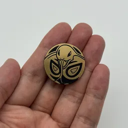 In hand, from Pokémon Coin Fan, full size