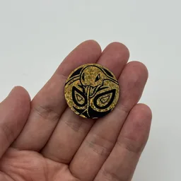 In hand, from Pokémon Coin Fan, full size