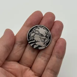 In hand, from Pokémon Coin Fan, full size