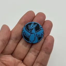 In hand, from Pokémon Coin Fan, full size