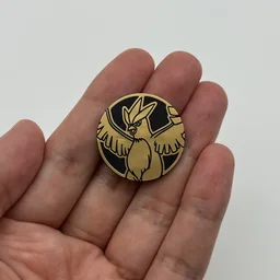 In hand, from Pokémon Coin Fan, full size