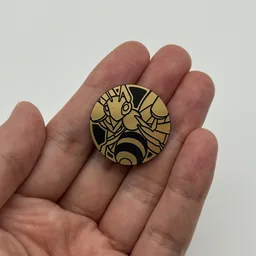 In hand, from Pokémon Coin Fan, full size