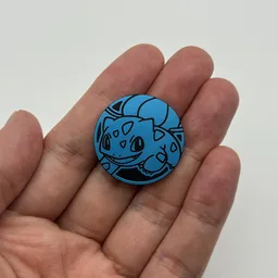 In hand, from Pokémon Coin Fan, full size