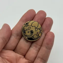 In hand, from Pokémon Coin Fan, full size