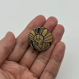 In hand, from Pokémon Coin Fan, full size
