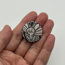 In hand, from Pokémon Coin Fan, full size