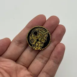 In hand, from Pokémon Coin Fan, full size