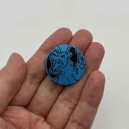 In hand, from Pokémon Coin Fan, full size