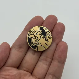 In hand, from Pokémon Coin Fan, full size
