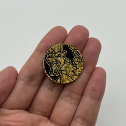 In hand, from Pokémon Coin Fan, full size