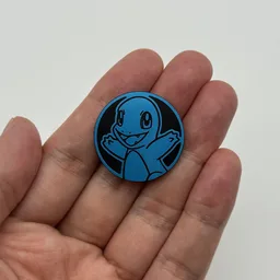 In hand, from Pokémon Coin Fan, full size