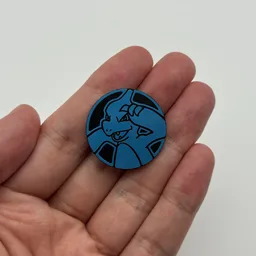 In hand, from Pokémon Coin Fan, full size