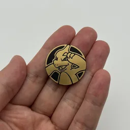 In hand, from Pokémon Coin Fan, full size
