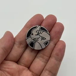 In hand, from Pokémon Coin Fan, full size