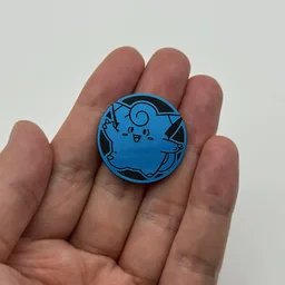 In hand, from Pokémon Coin Fan, full size