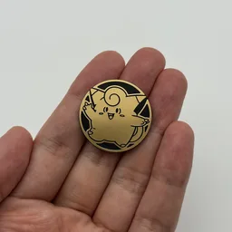 In hand, from Pokémon Coin Fan, full size