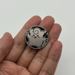 In hand, from Pokémon Coin Fan, full size